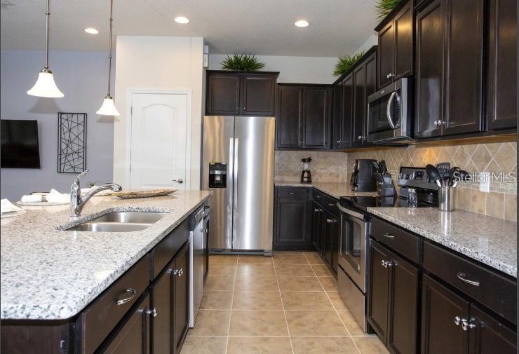 Photo of 8875 Geneve Ct, Kissimmee, FL 34747 (MLS # O6422639)