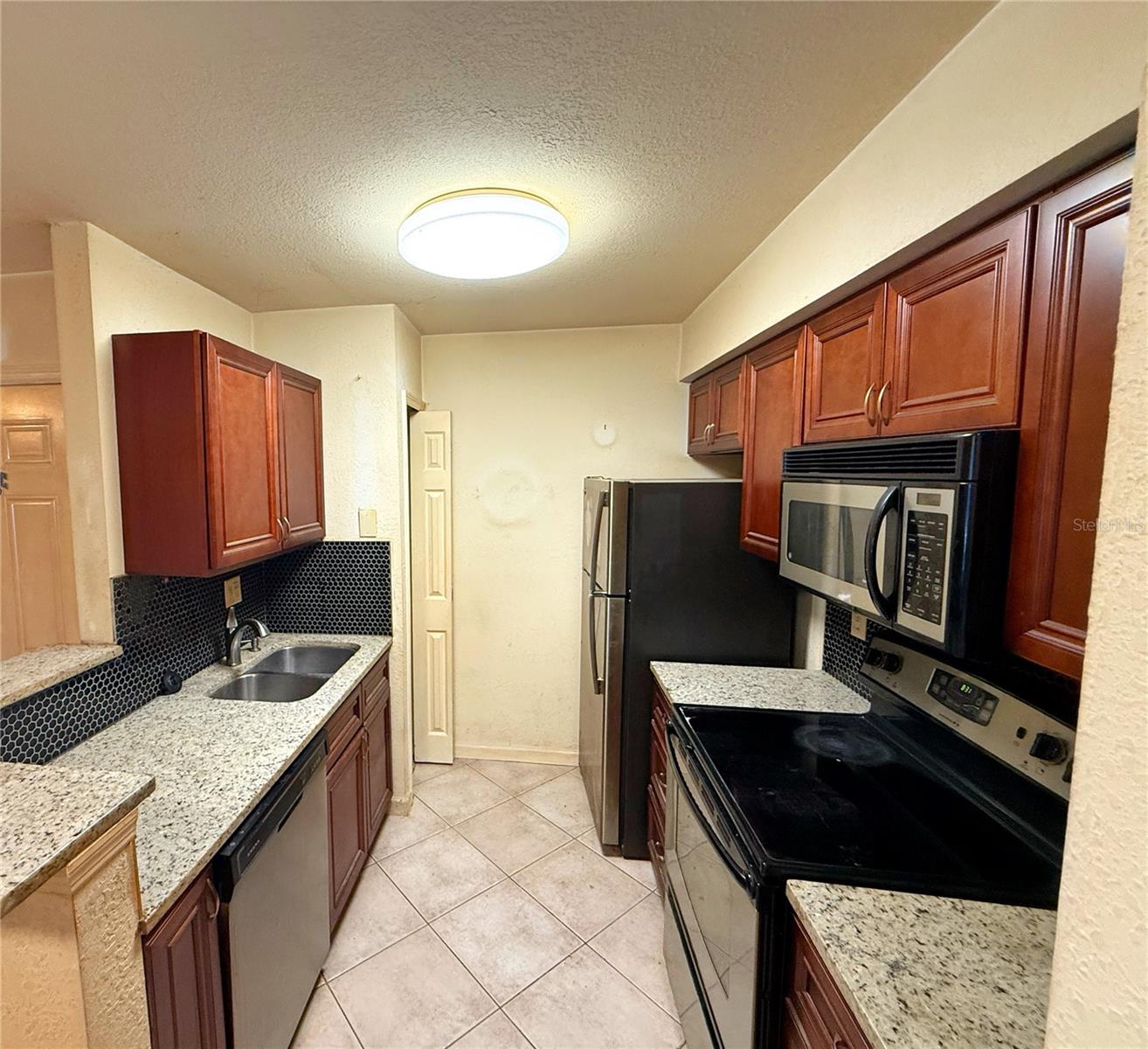 REGENCY PARK AT LAKE MARY A CONDO - Residential