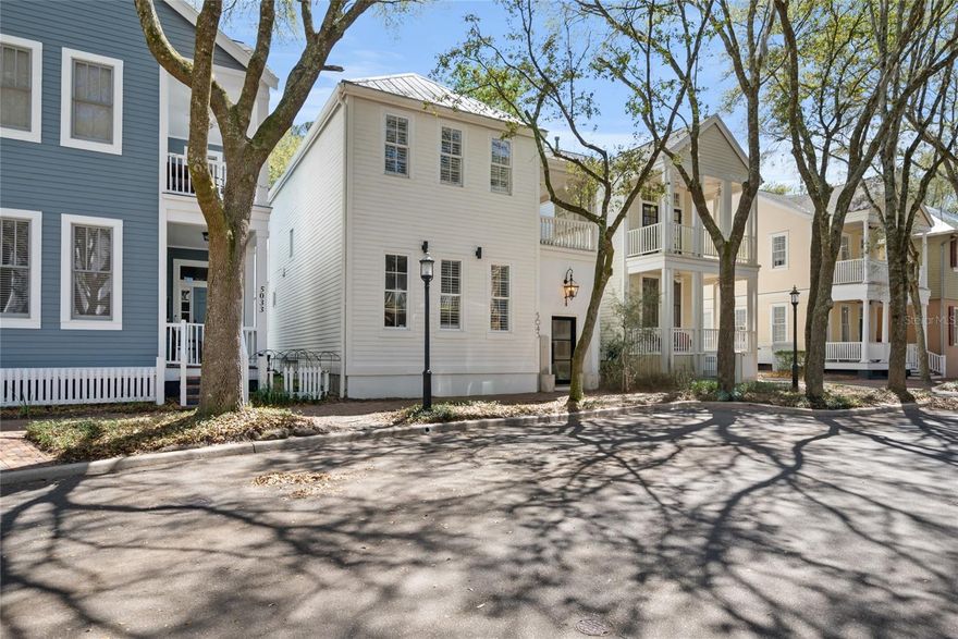 Incredible Rental Property! 2/2 Main House rents $3,500/month and 1/1 Apartment Rents $2500/month. Discover this beautifully updated 2025 Charleston-style home located in the heart of Haile Village Center. The property includes 2 bedrooms and 2.5 bathrooms in the main residence, plus a private 1 bedroom, 1 bathroom carriage-style apartment with a full kitchen and separate entrance—ideal for extended family, guests, or generating additional rental income. Whether you’re looking for a primary residence with flexibility or an investment opportunity, this home offers versatile living options and excellent rental potential in one of Gainesville’s most desirable neighborhoods. Inside the main home, enjoy soaring 10- and 12-foot ceilings, all-new flooring, bathrooms, appliances, and custom finishes throughout. A striking iron and glass front door opens into a private front courtyard. The spacious layout provides serene courtyard views from both the kitchen and formal dining room, complemented by elegant French doors and professional outdoor lighting. The kitchen is a true highlight, featuring three ovens, an expansive island, and a large butler’s pantry. The open family room includes a gas fireplace, and a convenient mudroom leads to an oversized two-car garage. Upstairs, the primary suite opens to a private balcony overlooking a tranquil fountain and includes a luxurious en-suite bathroom with a glass walk-in shower and marble accent wall. A second bedroom also features its own en-suite bath and balcony access. Community Highlights: Access to clubhouse, pools, fitness centers, tennis courts & golf course Walkable to shops, restaurants, and a local coffee spot Weekly Saturday farmers’ markets Scenic walking and biking trails 6.5 miles to UF and Shands Hospital Free park-and-ride village shuttle Timeless charm, modern upgrades, and built-in flexibility—this unique property is perfect for those seeking comfort, community, and long-term value.