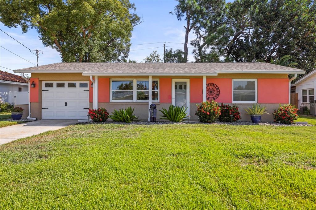 Photo of 1215 Lazy Lake Road E, Dunedin, FL 34698 (MLS # TB8444089)