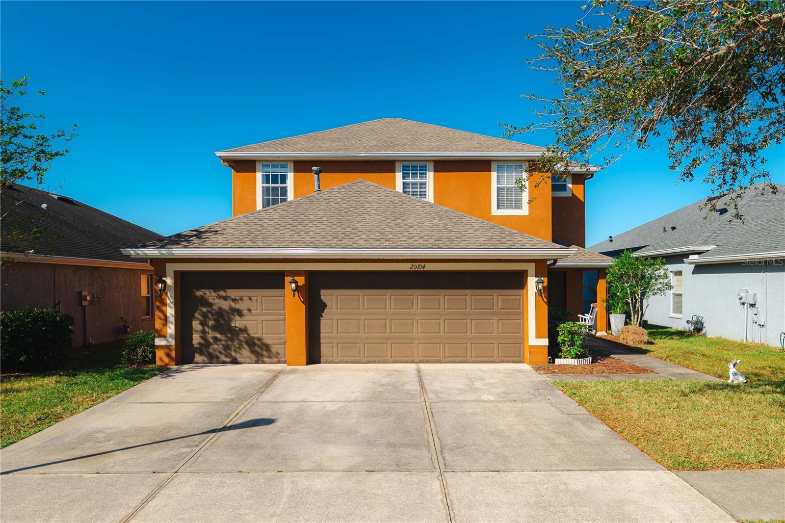 Gated Community - LIVE OAK. Conveniently located in New Tampa. New Roof 2022 .This 5 bedroom, 3 bath, 3 car garage, home will not disappoint. Enter to the high volume ceilings of the formal Dining/Living Room combination. Large open kitchen, Eat-in space in Kitchen large enough for 6 person table. Open to family room - so you can see all that is going on while in the kitchen. All of downstairs has Marble Flooring. Wood Laminate Stairs and in all Bedrooms upstairs. Beautiful pond view thru slider doors. Large Main Bedroom features plenty of room for all of your furniture. Spacious for an additional sitting room, large walk-in closet. Large Master Bathroom featuresl, double vanities Bedrooms #3 and #4 are adequately sized. Bedroom #5 is oversized with large Walk-In Closet. All share full bath. Bedroom #2 is located on the first level with full bathroom across the hall. Live Oak Community has three entrances. Large Community Center features Clubhouse, Fitness Center, Lap Pool, Zero Entry Pool, Community Playgrounds throughout, Tennis Courts. Conveniently located to Schools, Restaurants, Shopping, Offices, I-75, USF, Morris Bridge Road, Hospitals, Wiregrass Mall, Premium Outlet Mall and all that New Tampa and Wesley Chapel have. Welcome Home to your new "Live" Oak Community ! New Roof 2022, New Fence.
