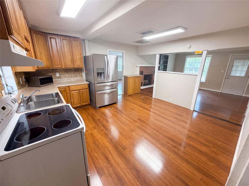 Photo of 345 Acropolis Drive, Dunedin, FL 34698 (MLS # O6432858)