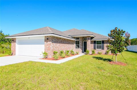 Photo of 58 Sea Breeze Trail, Palm Coast, FL 32164 (MLS # FC314640)