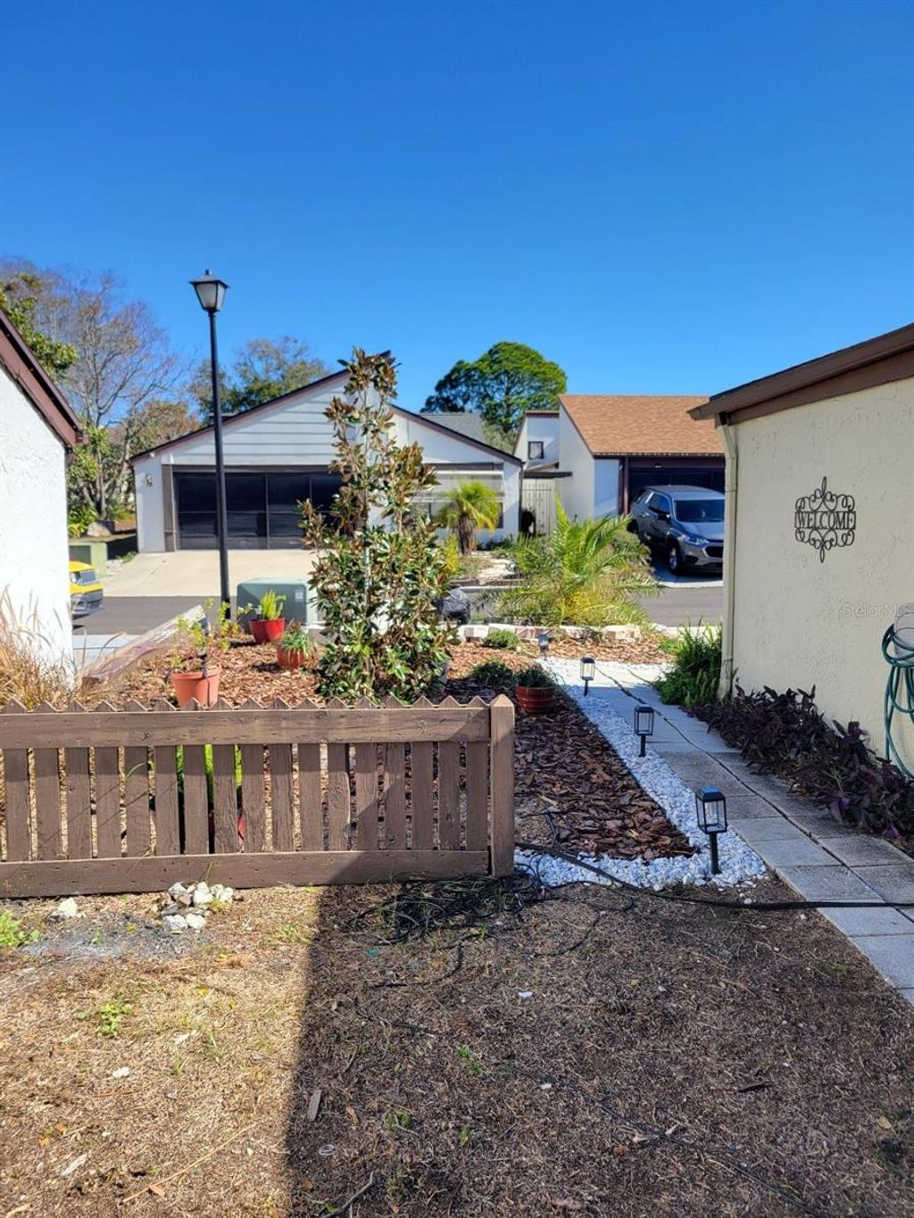 Photo of 12231 Magnolia Grove Lane, Hudson, FL 34667 (MLS # TB8468731)