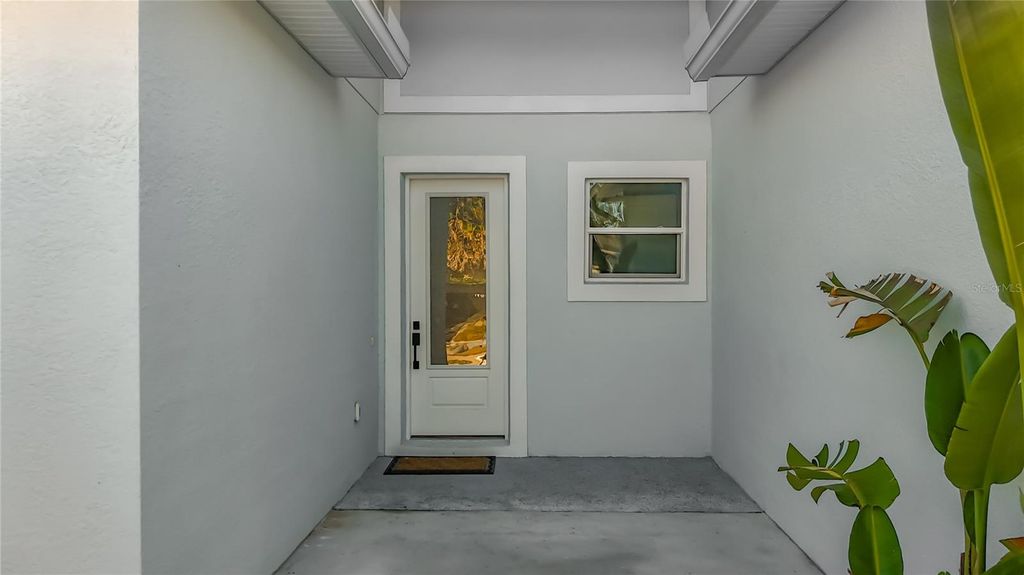 Photo of 1306 E Lemon Street, Tarpon Springs, FL 34689 (MLS # TB8462346)