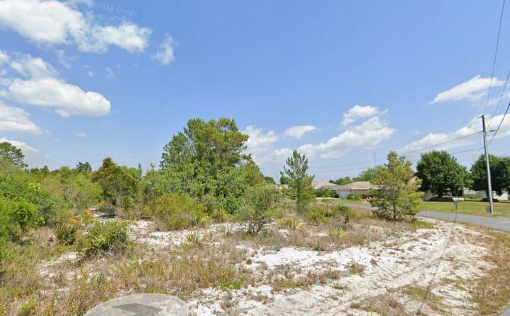 Photo of 103 Vera Lane NW, Lake Placid, FL 33852 (MLS # C7517384)