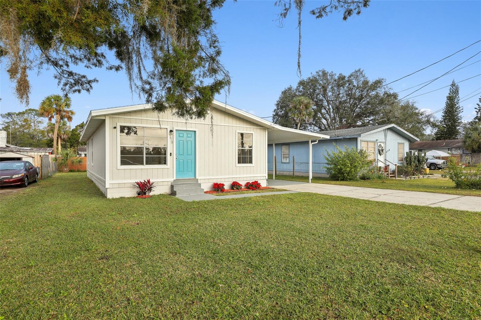 NOT a Mobile or Manufactured Home - This is a Single Family Home. This 3-bedroom, 2-bath home sits on concrete block foundation. It features a brand-new roof, new luxury vinyl plank flooring in the main living areas, and new carpet in the bedrooms. The kitchen includes updated cabinets, granite countertops, and new stainless steel appliances. Both bathrooms have been renovated with modern finishes. No HOA. Located just minutes from Daytona Beach.