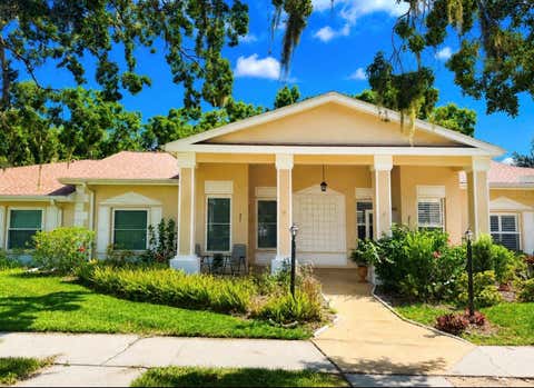 Photo of 307 Kinneret Way, Sun City Center, FL 33573 (MLS # TB8529188)