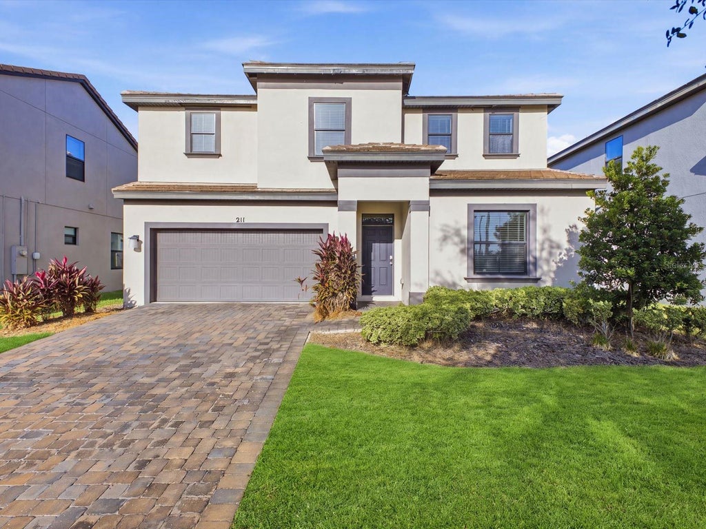 Photo of 211 Macaulays Cove, Haines City, FL 33844 (MLS # O6452597)