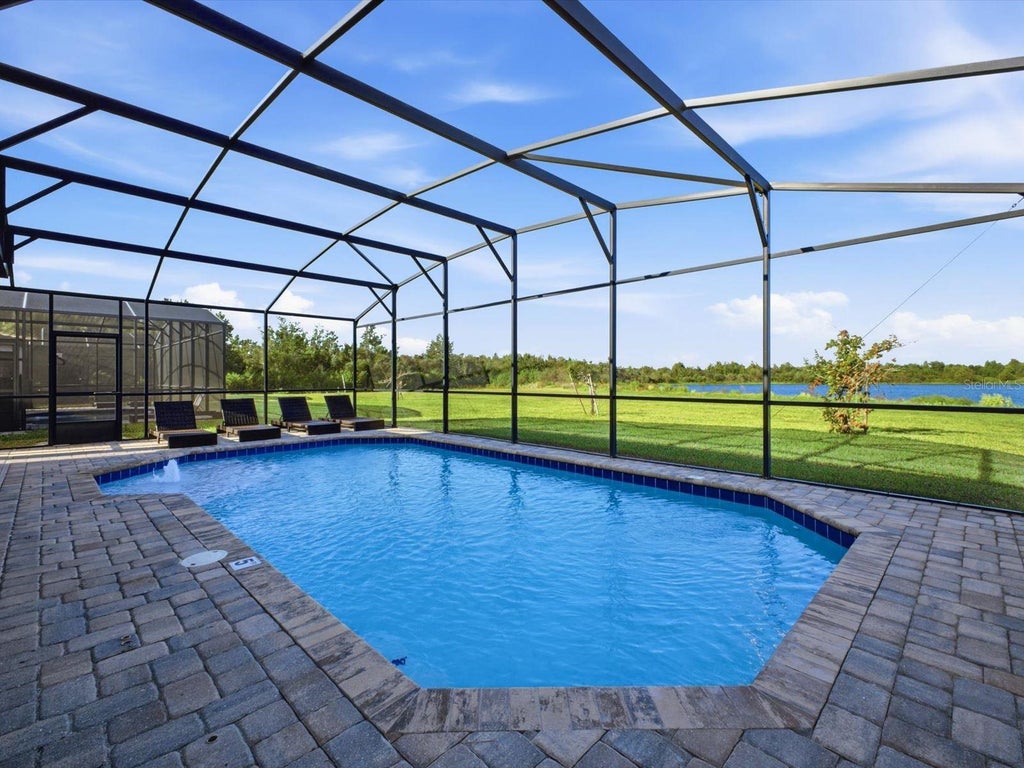 Photo of 211 Macaulays Cove, Haines City, FL 33844 (MLS # O6452597)