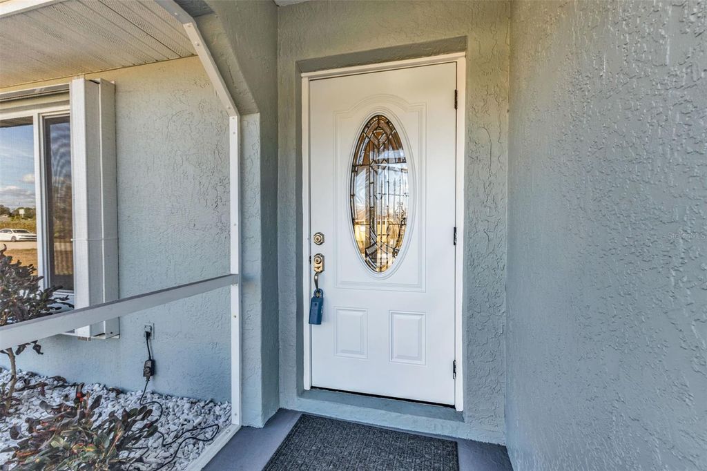 Photo of 625 Ennis Terrace NW, Port Charlotte, FL 33952 (MLS # C7517512)