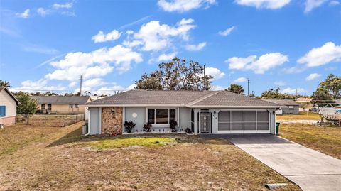 Photo of 625 Ennis Terrace NW, Port Charlotte, FL 33952 (MLS # C7517512)