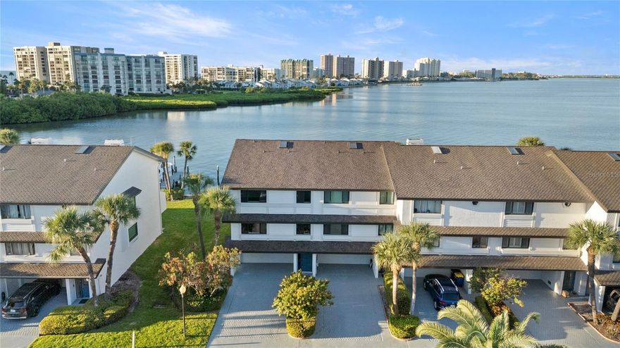 *12 month annual lease - unfurnished - no pets* Beautiful waterfront townhouse with boat dock at Marina Del Rey Sand Key. 4 bedroom 2.5bath, 2250 square ft. with a two car garage. Full-size washer and dryer with and extra room for an office or workout area. Community has a heated pool and just a short walk to Sand Key Beach.