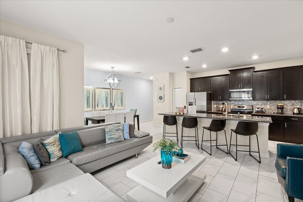 Photo of 9075 Dogleg Dr, Davenport, FL 33896 (MLS # S5144856)