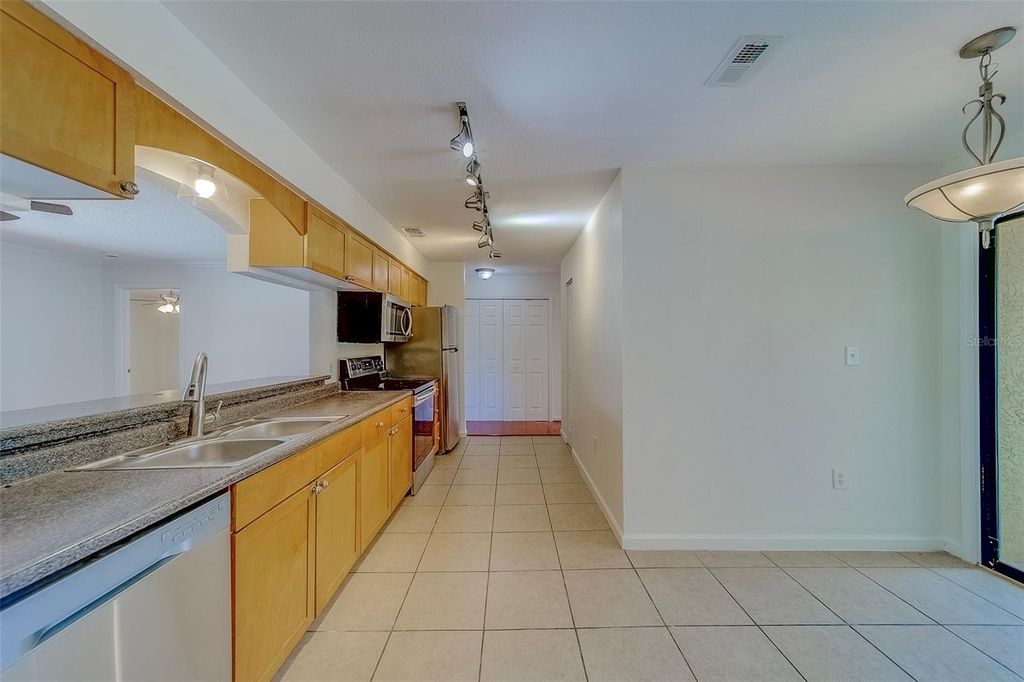 Photo of 10195 Sailwinds Boulevard N #202, Largo, FL 33773 (MLS # TB8439731)