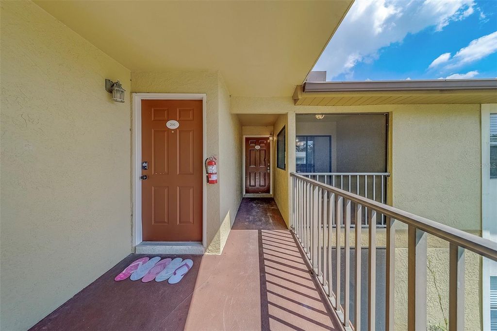 Photo of 10195 Sailwinds Boulevard N #202, Largo, FL 33773 (MLS # TB8439731)