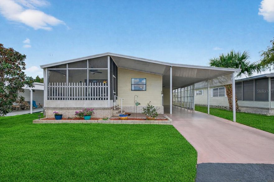 Welcome to relaxed, low-maintenance living in the highly sought-after 55+ community of Club Chalet—a centrally located community featuring comfort, convenience, and outstanding value just minutes from everything you love about Florida living. This inviting 2-bedroom, 2-bath residence with 1,056 square feet of living space is thoughtfully designed to maximize space, storage, and natural light throughout. Vaulted ceilings create an open and airy atmosphere throughout the main living areas, while newer flooring adds a fresh, modern feel and enhances everyday comfort. Large windows allow sunlight to fill the home, creating a bright and welcoming environment from morning through evening. The well-planned layout offers excellent flow between the living and dining areas, making both entertaining and daily living effortless. The kitchen provides generous cabinet and storage space—perfect for keeping everything organized and within reach. The spacious primary bedroom serves as a peaceful private retreat, featuring a walk-in closet and a private en-suite bath, presenting comfort and privacy for everyday living. A well-appointed guest bedroom and second full bath provide ideal accommodations for visiting family and friends. One of the home’s standout features is the oversized covered carport with tandem parking for up to three vehicles—a rare and highly desirable amenity in the community. A screened patio extends your living space outdoors, creating the perfect setting to enjoy Florida’s beautiful weather, morning coffee, or quiet evenings with friends. Storage is abundant throughout the home, including a large laundry room with additional space ideal for bikes, beach chairs, seasonal items, and hobby equipment—making organization easy without sacrificing living space. Residents of Club Chalet enjoy a relaxed and social lifestyle with a low monthly HOA that provides exceptional value where you own the land. The fee includes water, sewer, trash pickup, cable, and internet, allowing for simplified monthly budgeting. The community also features a heated swimming pool, perfect for year-round enjoyment and connecting with neighbors. Ideally located close to shopping, dining, and everyday conveniences—including shopping, nearby Publix Super Market and Target—this home is also sits high and dry and just minutes from Florida’s top-rated Gulf beaches, offering endless opportunities for recreation, relaxation, and coastal adventures. Whether you are searching for a full-time residence or a seasonal retreat, this beautifully maintained home delivers comfort, value, and peace of mind.