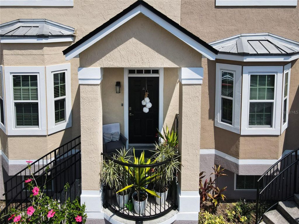 Photo of 6659 Time Square Avenue #103, Orlando, FL 32835 (MLS # O6367934)