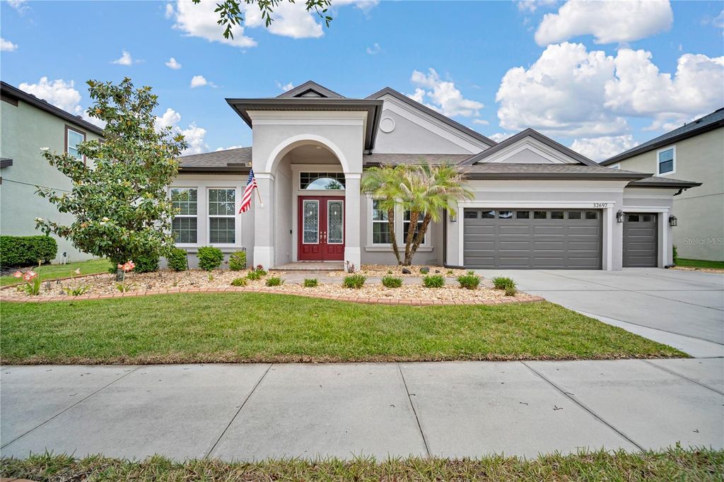 Photo of 32697 Natural Bridge Road, Wesley Chapel, FL 33543 (MLS # TB8492692)