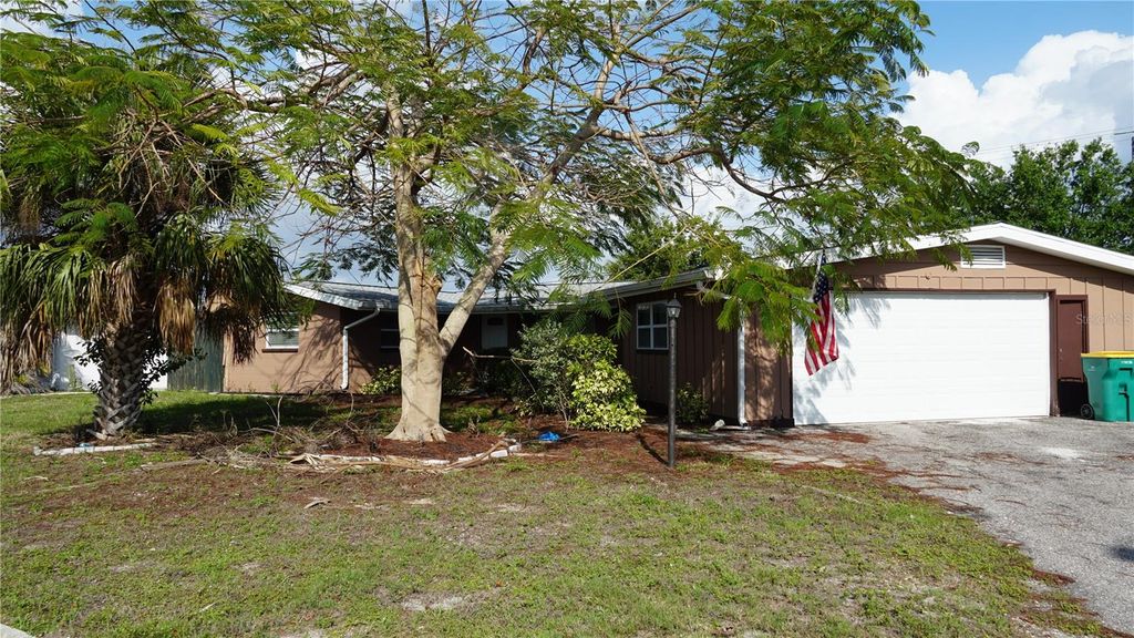 Photo of 3596 Harbor Boulevard, Port Charlotte, FL 33952 (MLS # O6385331)