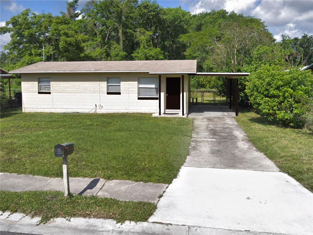 Photo of 306 Campus View Drive, Orlando, FL 32810 (MLS # O6357101)