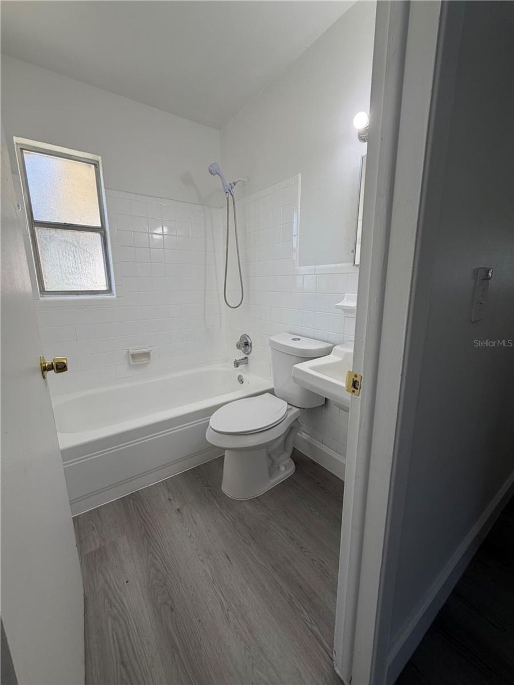 Photo of 306 Campus View Drive, Orlando, FL 32810 (MLS # O6357101)