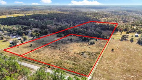 Photo of 22380 Powell Road, Brooksville, FL 34602 (MLS # TB8460672)