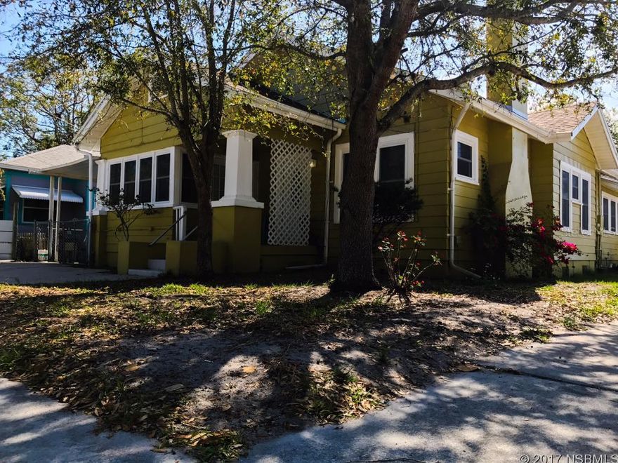INVESTOR ALERT!! A GRAND OPPORTUNITY to get in on the ground level of New Smyrna's up and coming Historic District.  Located Between US-1 and the River.  A Charismatic Home built in 1924 with original hardwood floors & doors, Newer Roof, Electrical Wiring, Double Pane Windows, Water Heater, A/C Unit, Ridge Vents, Insulation, Screens, Garage Door, and Paint. Crown Molding, Detached Garage, High Ceilings, Drop Down Stair to Attic, Corian Counter Tops, Jetted Tub, and Wheel Chair Ramp.  Four point inspection is available.  Close to Canal Street a hot spot for shopping, restaurants, which hosts a number of events throughout the year.  Flagler Ave, River, Brandon Center, Marina, and the Beach all less than 5 minutes away.  The new large hotel on Flagler is almost open,  New Beach Bar Opening soon, Another new large hotel is planned for 3rd Ave Area, New Marina/Restaurant is to be built next to Captains Quarters, Townhomes being built next to City Hall, and the former marine discovery center land slated to be developed.  This property is a bargain considering what NSB will look like in a few years.  Get in on the ground floor at today's prices. ;Water: City