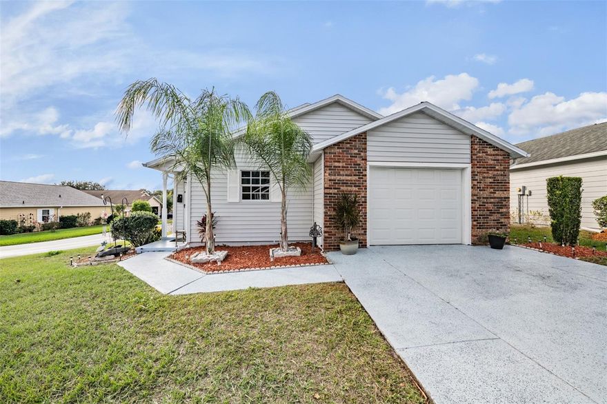 Beautiful new listing in Wedgewood Manor, a 55-plus community in the heart of Zephyrhills! You'll love this open and inviting floor plan, the spacious kitchen has ample cabinetry for storage and a pass-through to the dining area. The living room and dining room are open with a vaulted ceiling and lots of natural lighting. The Florida room is ideal for many options such as office, guest room, workout room or crafting room. The primary bedroom is quite spacious with a large walk-in closet. The primary en-suite has a shower and dual vanities. The second bedroom is a nice size, and the guest bath has a walk-in jetted tub. This home has a one-car garage and a wonderful corner lot. Newer home features include great new wood look, luxury vinyl planking throughout the home, roof-2021, air conditioner-2018, water heater-2024, garage door-2022 and coordinated ceiling fans. Homeowners’ association is quite reasonable and includes internet, cable, lawn care, a centrally located recreational center with a screened-in pool, shuffleboard courts and great planned activities. This Zephyrhills community and location is growing quickly and has access to restaurants, shopping, medical facilities and more.