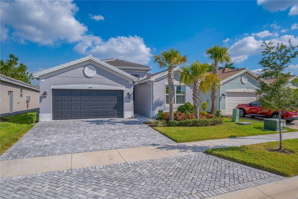 Photo of 4879 Avila Lakes Drive, Wimauma, FL 33598 (MLS # TB8448751)