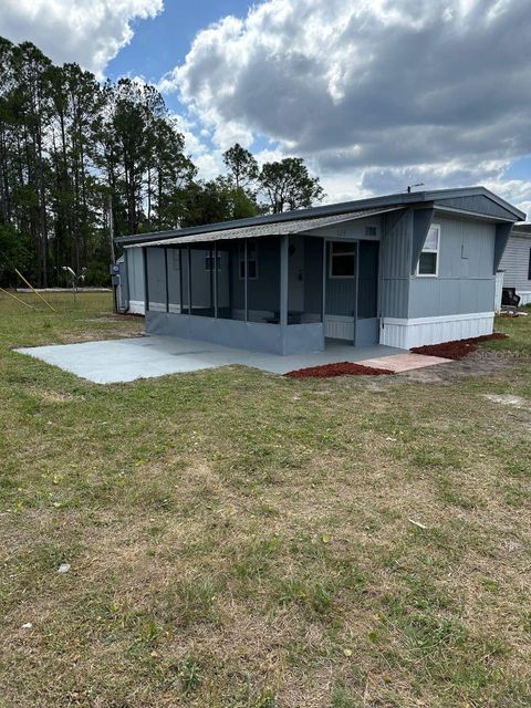 Photo of 126 Cypress Street, Crescent City, FL 32112 (MLS # S5123799)