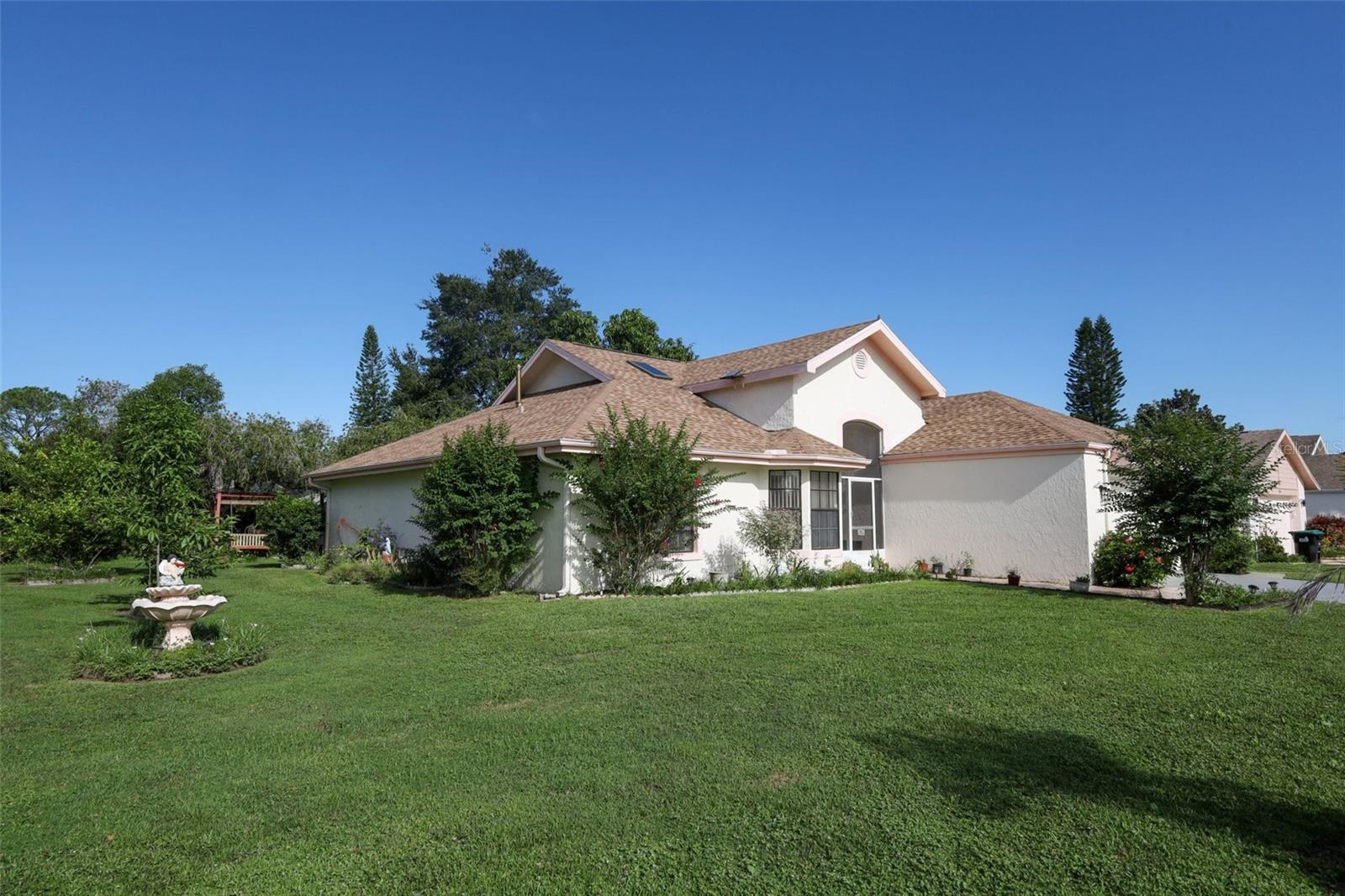 Welcome home! This is a beautiful three-bedroom, two-bathroom split plan home located in the Somerset Village subdivision of South Orlando. Upon arriving at the home, the first things you'll notice are the well-kept lawn and oversized gardening area that encompass the front and side of the home. Take a step inside, and you'll walk into the front living area where the kitchen is located. Enjoy cozy breakfasts in the large eating space located in the kitchen. Each of the bedrooms is large and bathed in wonderful natural light. The primary bedroom is oversized with two walk-in closets. The back of the home has a fantastic enclosed lanai with access from the family room as well as the primary bedroom. The space is perfect for entertaining or just relaxing on a lazy Sunday afternoon. This prime location offers unparalleled convenience, with the airport just minutes away as well as easy access to downtown Orlando and all major highways. There is no shortage of things to do in all directions from this location. Enjoy SeaWorld and Disney, and indulge in the vibrant culinary scene at the renowned Restaurant Row in Dr. Phillips. Entertainment enthusiasts will relish being in close proximity to the excitement of International Drive. Shopping, including Publix, is 5 minutes away! Experience the perfect blend of convenience, comfort, and entertainment that this Williamsburg gem has to offer. All in all, this little gem at a great price, combined with a newer 2020 roof, you won't want to miss out!