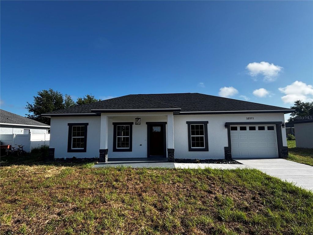 Photo of 10311 SE 125th Lane, Belleview, FL 34420 (MLS # OM724269)