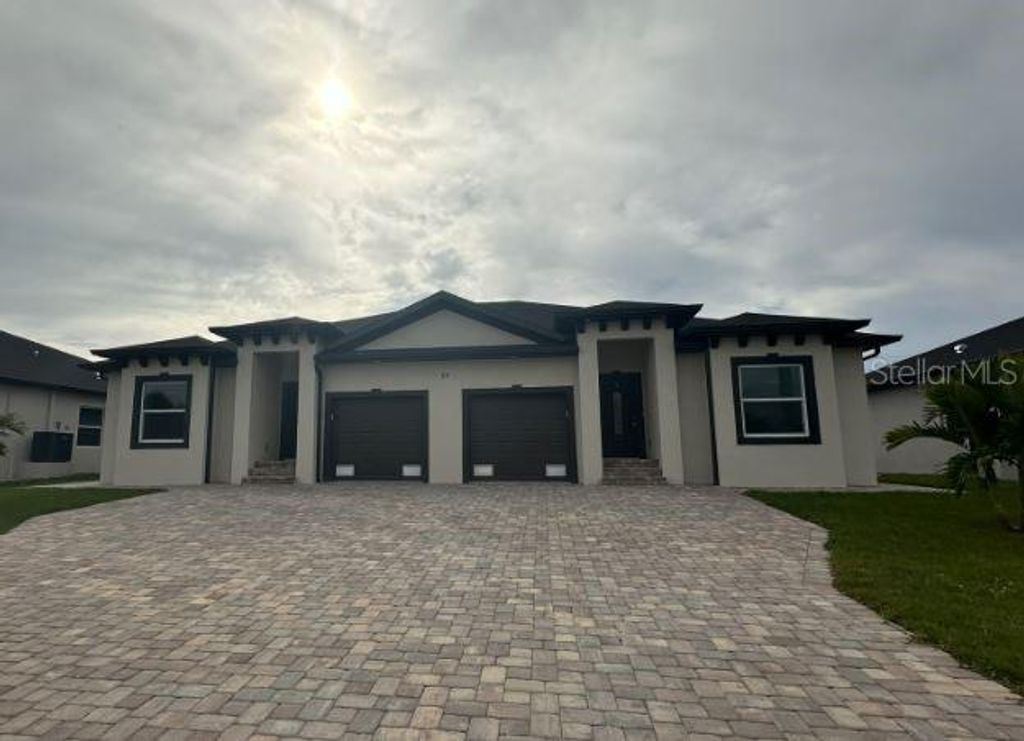 Photo of 55 Boundary Boulevard #A, Rotonda West, FL 33947 (MLS # A4697592)