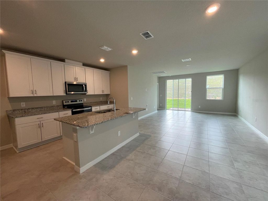 Photo of 3152 Bella Vista Drive, Davenport, FL 33897 (MLS # O6377081)