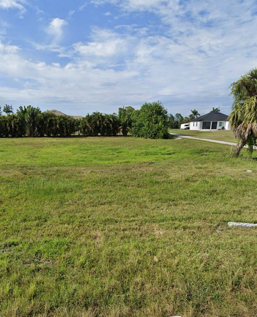 Photo of 113 White Marsh Lane, Rotonda West, FL 33947 (MLS # A4681737)