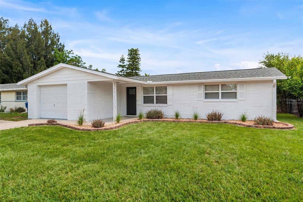 Photo of 3521 Bigelow Drive, Holiday, FL 34691 (MLS # O6409940)