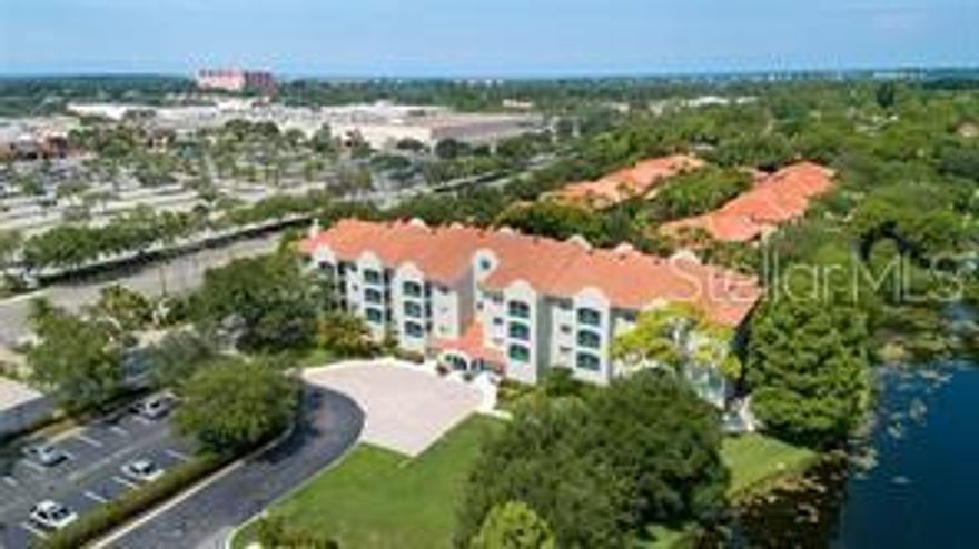 Palmer Club at Prestancia in Palmer Ranch, Across from Sarasota Sq mall, minutes to Publix, Target, JC Pennys Costco, Lowe’s and many restaurants. Short drive to beautiful Siesta Key& Nokomis beach, the library and Legacy Trail. This two bedroom, two bath with office condo has large rooms, two huge walk-in closets & office. Sliding glass doors from the great room lead to a screened balcony with water view and storage closet. Nine-foot ceilings with light, bright rooms. Full-sized washer/dryer, crown molding, remodeled kitchen with stainless steel appliances, lots of storage space, easy access storm shutters, this is the perfect place to call home or use as a second home to enjoy all Sarasota has to offer. covered assigned parking and more garage storage are an added plus.