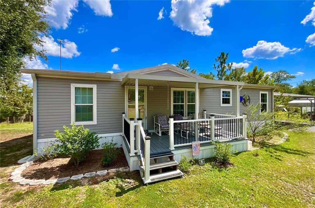 Photo of 104 Silver Dollar Drive, Hawthorne, FL 32640 (MLS # GC544008)