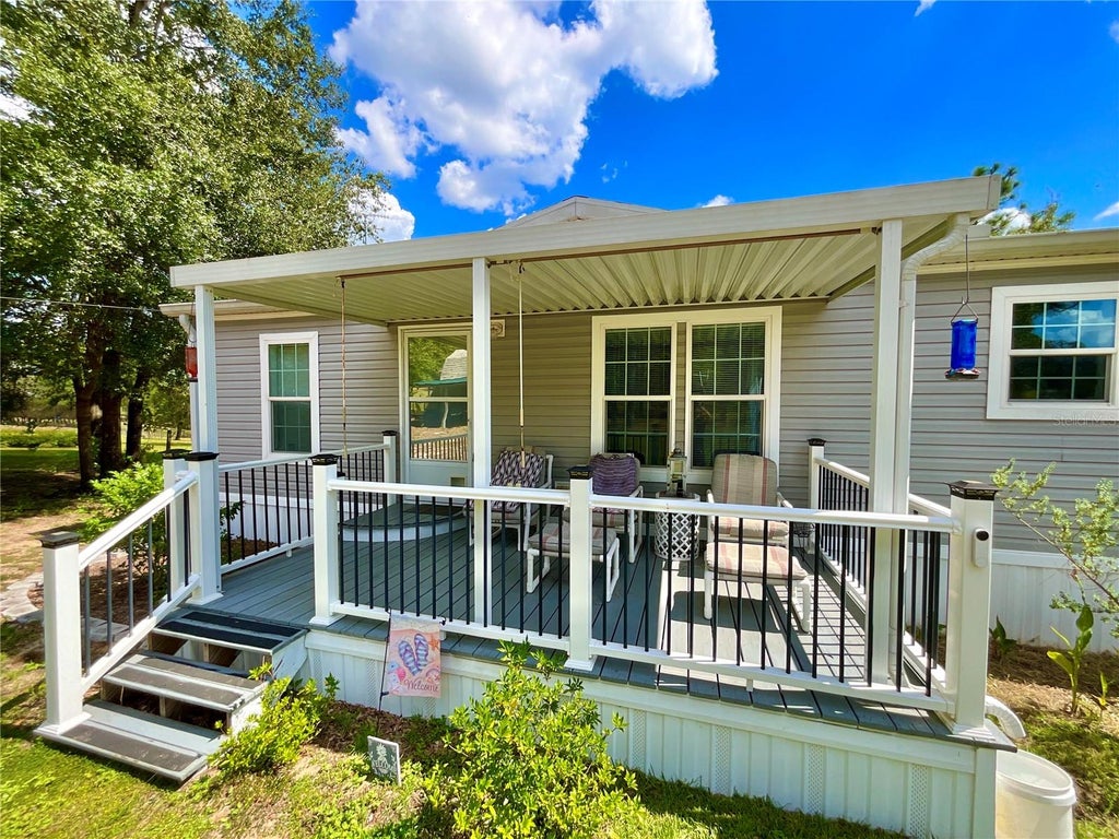 Photo of 104 Silver Dollar Drive, Hawthorne, FL 32640 (MLS # GC544008)