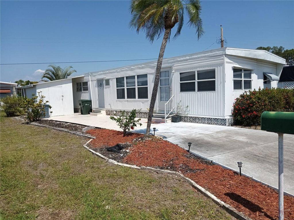 Photo of 5118 Oakland Hills Avenue, Sarasota, FL 34234 (MLS # A4653112)