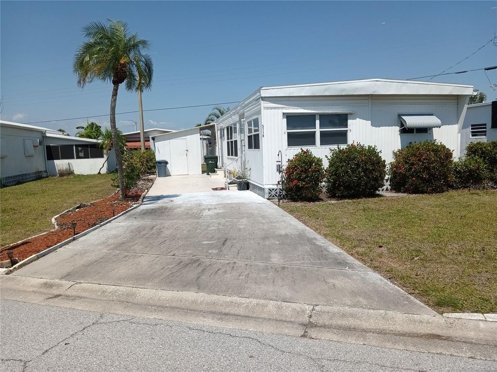 Photo of 5118 Oakland Hills Avenue, Sarasota, FL 34234 (MLS # A4653112)