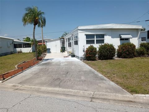 Photo of 5118 Oakland Hills Avenue, Sarasota, FL 34234 (MLS # A4653112)