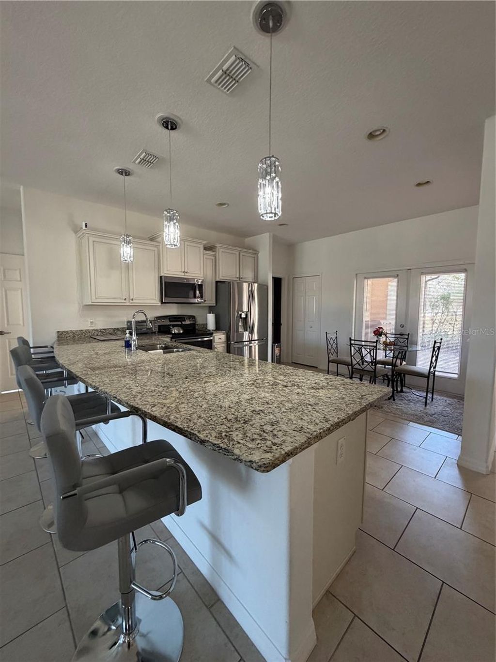 Photo of 392 Villa Sorrento Circle, Haines City, FL 33844 (MLS # O6383367)