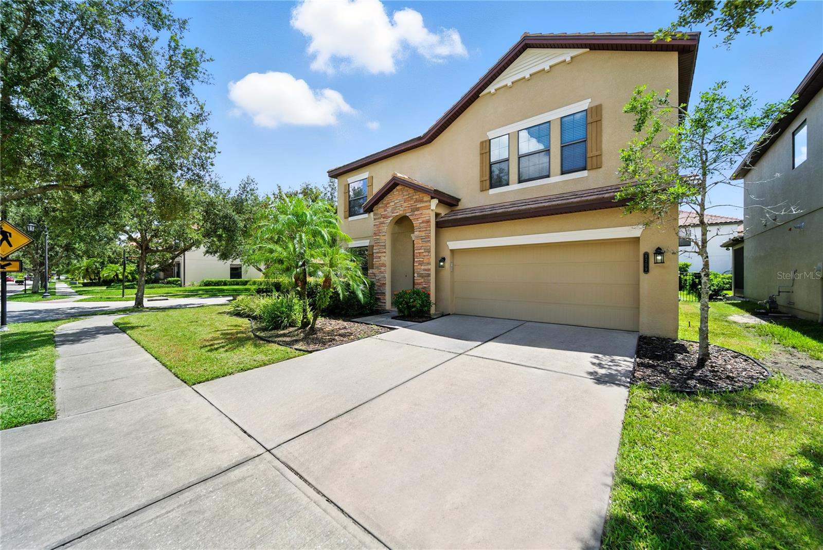 Beautiful 4-bedroom, 2.5-bath home with 2-car garage featuring an open-concept floor plan perfect for entertaining.
Upon entry, you’re welcomed by a formal living and dining combination that flows seamlessly into the spacious family room and kitchen. The kitchen boasts dark cabinetry, granite countertops, stainless steel appliances, and a generous island, making it the heart of the home. Just off the kitchen, you’ll find a large laundry room with ample storage. The first floor is finished with elegant ceramic tile throughout, while the second floor now features brand new laminate flooring and fresh interior paint. Upstairs, you’ll discover four bedrooms, two full baths, and a versatile loft area. The primary suite offers abundant natural light, a walk-in closet with plenty of storage, and a luxurious en-suite bath complete with dual sinks, a garden tub, and a separate shower. Secondary bedrooms are generously sized and include closet organizers, while the shared bath offers dual sinks and a tub/shower combo.Step outside to enjoy the expansive backyard with a large covered patio—ideal for outdoor gatherings and relaxationThis gated, master-planned community combines the charm of Old Florida with modern conveniences and a resort-style lifestyle. Residents can take advantage of a sparkling pool, relaxing spa, state-of-the-art fitness center, tennis courts, and so much more. Don’t miss the opportunity to experience everything Grand Hampton has to offer—call today to schedule your private showing!