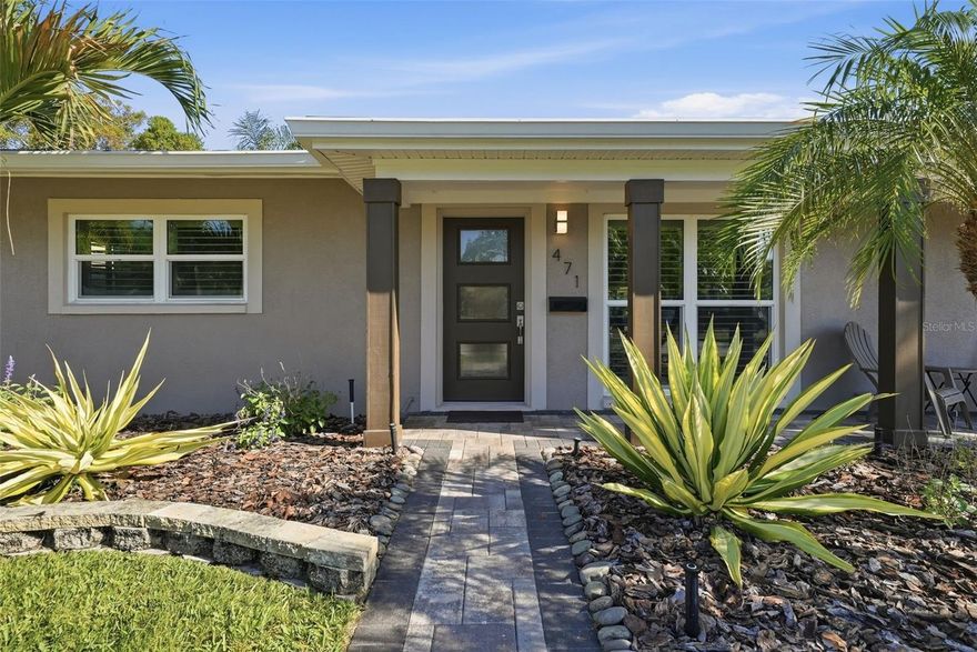 Fresh updates, smart improvements, and outdoor space that gives you options—471 42nd Ave NE checks the boxes for buyers who want a move-in-ready home in a location that puts them close to it all. From the moment you arrive, the fresh exterior paint, circular driveway, and and a beautiful mix of mature palms that give this home a polished tropical feel.  The covered front porch gives you a comfortable place to relax, while the carport offers convenient access straight into the kitchen. The kitchen has been beautifully updated with solid wood cabinetry, quartz countertops, and stainless steel appliances. There is also a designated laundry room with the newer electrical panel, water heater, and added storage space. The covered front porch creates a welcoming place to sit and enjoy the outdoors, while the carport offers easy access directly into the kitchen. Inside, this remodeled 2 bedroom, 1 bathroom home features an open floor plan, wood-look tile flooring, hurricane-rated windows, and a beautifully updated bathroom. The bedrooms have built-in closets and plenty of natural light.
The backyard gives you the space and flexibility buyers are looking for, with endless possibilities to entertain, expand, or create your dream outdoor setup. Enjoy the screened lanai, an outdoor shower for cooling off, and room to add a pool. There is a deep well for watering, a shed for extra storage, and paved alley access that makes it easy to accommodate an RV or boat. Located in a golf cart-friendly community, you are just a short distance to waterfront Downtown St. Pete. Nothing beats the close proximity to all that you need, from shops and parks to Crisp Park’s boat ramp, picnic areas, and fitness playground. This is a move-in-ready home with updates already done, outdoor space that gives you options, and a location that makes everyday living that much better. Opportunities like this do not sit still. Make your appointment today!