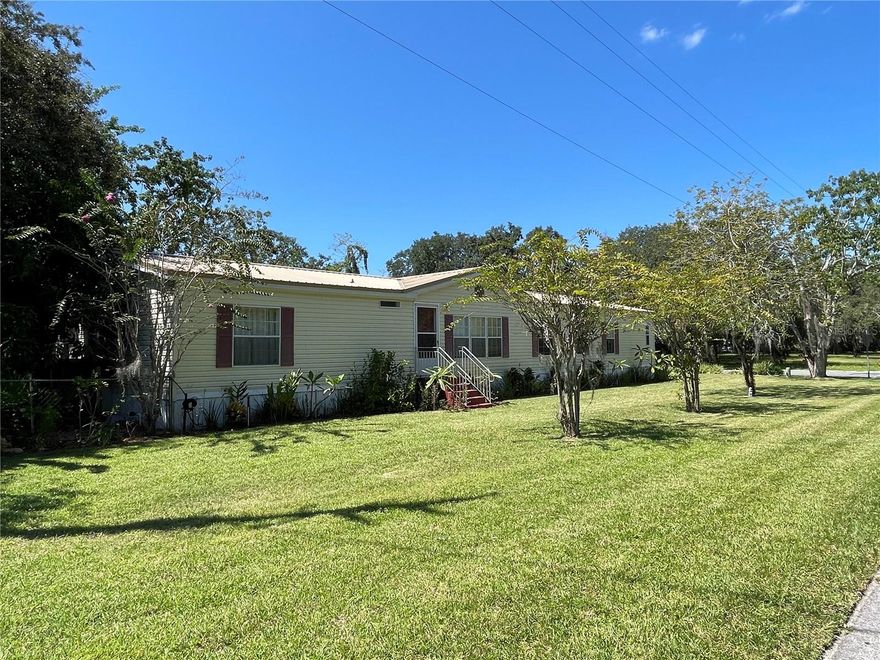 **BEST VALUE PER SQUARE FOOT CURRENTLY AVAILABLE IN THE NEIGHBORHOOD!**

BUYER OPPORTUNITY: This property may qualify for USDA financing (zero down) or the Lake County SHIPP Program offering up to $30,000 in down payment and closing cost assistance — depending on buyer eligibility, income limits, and program availability.

Offering 2,128 square feet, this is the LARGEST manufactured HOME currently AVAILABLE in the community — delivering 300–600 MORE SQUARE FEET than competing properties at a COMPARABLE PRICE POINT.

Located on a CORNER LOT in a PEACEFUL Astatula community, this 2005 DOUBLE-WIDE combines meaningful system UPGRADES with a FLEXIBLE layout designed to adapt to real-life needs.

Featuring 4 bedrooms, 2 full baths, a PRIMARY BEDROOM OFFICE, and plumbing already in place for a future HALF BATH and GARDEN TUB, the floor plan supports work-from-home flexibility and ROOM TO GROW.

The spacious primary suite includes an OVERSIZED RETREAT area — ideal for a NURSERY, private OFFICE, FITNESS SPACE, or optional 5th bedroom — a level of VERSATILITY rarely found at this price point.

Major updates provide long-term confidence:
• METAL ROOF (April 2023)
• 16-SEER A/C (August 2024)
• PROFESSIONAL HOME LEVELING (July 2025)
• Select upgraded exterior doors with double-pane glass and built-in blinds

Additional highlights include an INSIDE LAUNDRY area, a generous 47’ x 12’ CARPORT, and a FULLY FENCED backyard offering usable outdoor space with room to personalize, garden, or enjoy pets, along with a mature MANGO TREE and a potential butterfly and hummingbird garden.

The community features a sparkling POOL, and the HOA includes WATER and SEWER — helping keep monthly expenses predictable.

Conveniently located near the Harris Chain of Lakes with easy access to Tavares, Mount Dora, and greater Orlando, this home offers SMALL-TOWN CHARM with connectivity.

Seller is open to discussing creative solutions that may assist with closing costs or financing, depending on terms.

If you’ve been searching for SPACE, flexibility, and MEASURABLE VALUE — this one deserves a closer look.