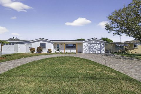 Photo of 12734 2nd Isle, Hudson, FL 34667 (MLS # TB8438431)