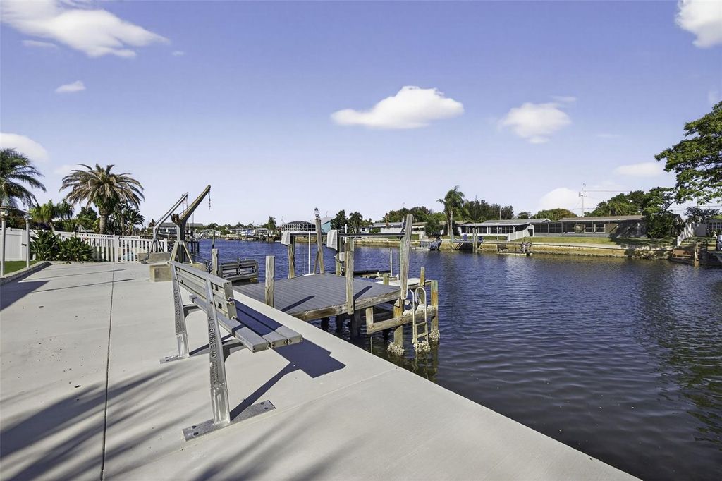 Photo of 12734 2nd Isle, Hudson, FL 34667 (MLS # TB8438431)