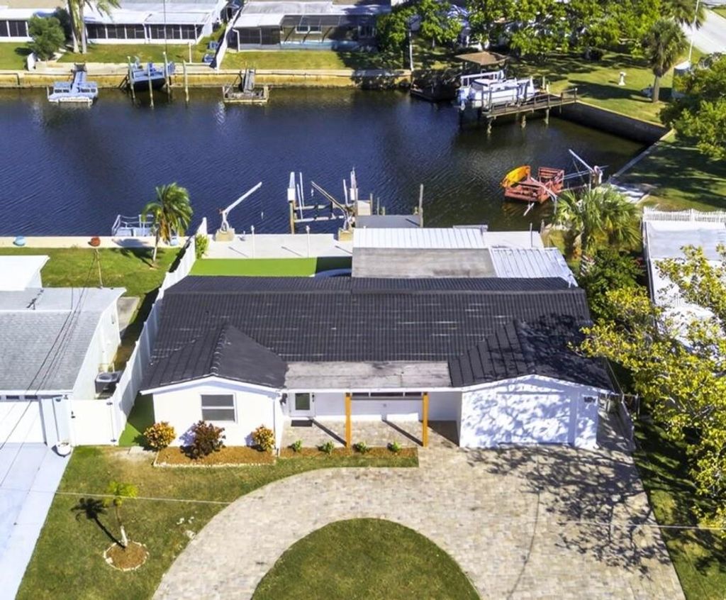 Photo of 12734 2nd Isle, Hudson, FL 34667 (MLS # TB8438431)